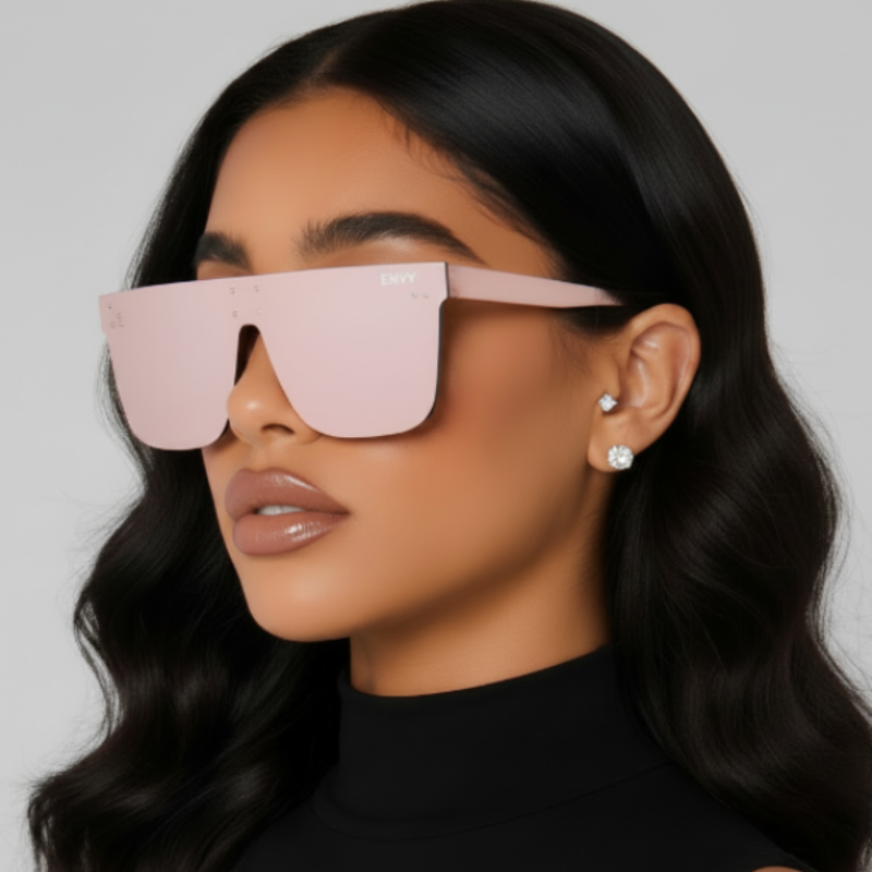 Woman wearing Belmain Deluxe pink sunglasses with a neutral background