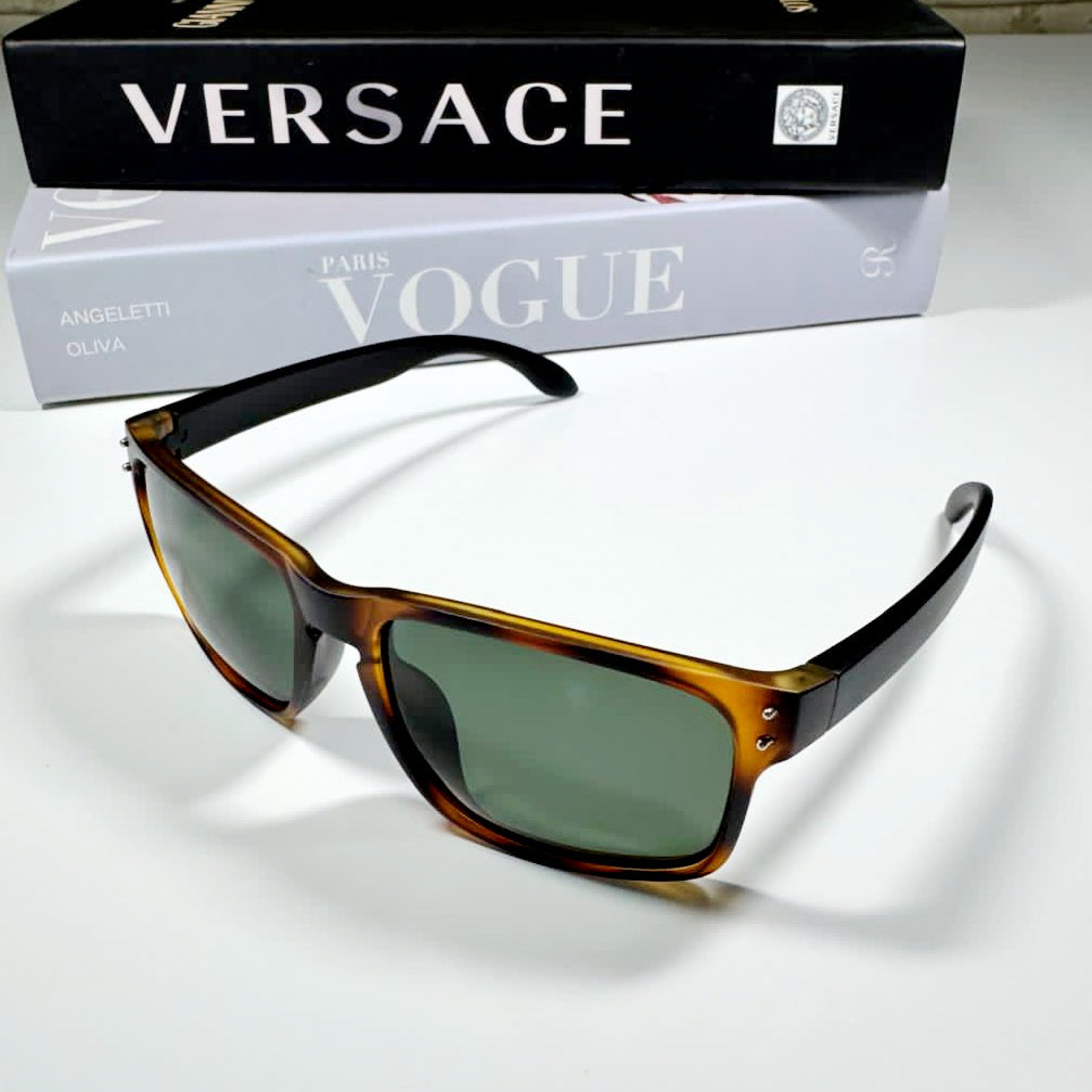 Mens tortoiseshell sunglasses showing front and black arms