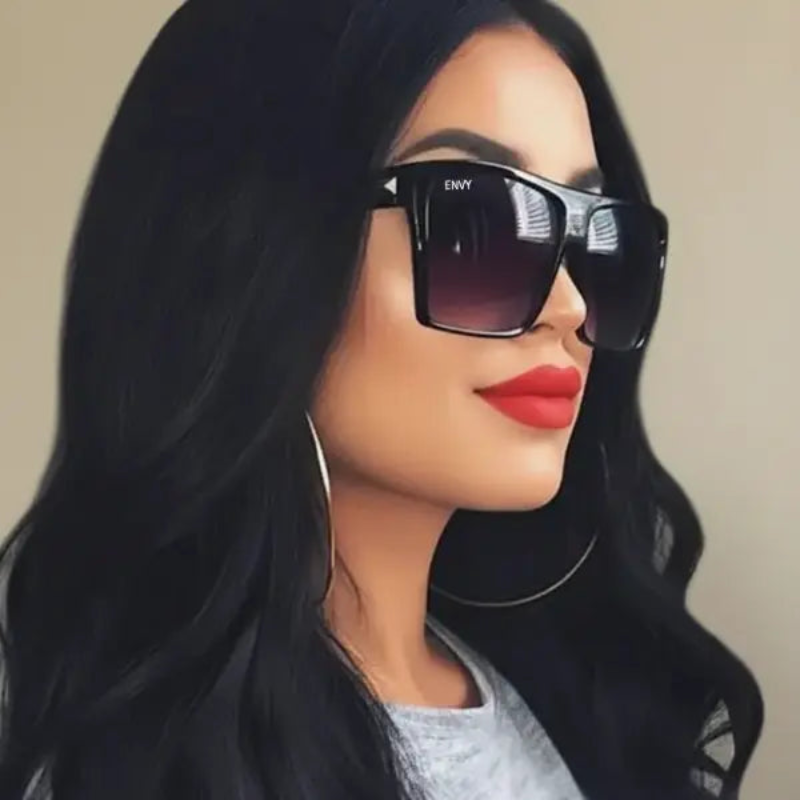 Woman wearing Envy Luxe sunglasses with a neutral background