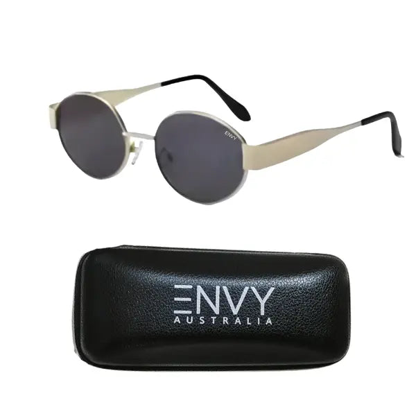 Oval sunglasses with dark lenses and a gold-tone metal frame, shown above a black textured case with the brand name ENVY AUSTRALIA.